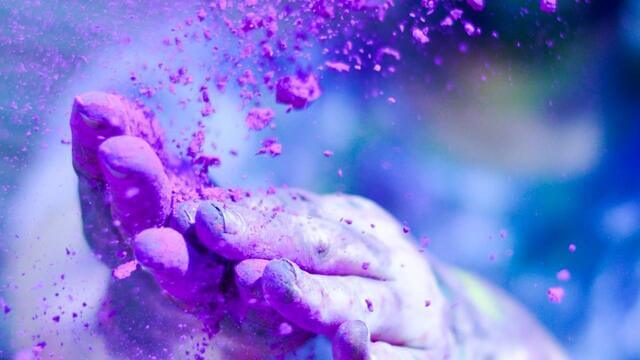 photo of hands covered in purple powder